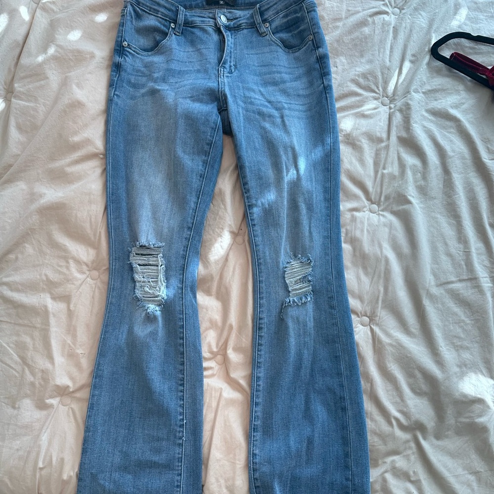 Fashion Nova Light Blue Distressed Flare Jeans